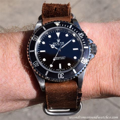 rolex submariner on brown leather strap|Rolex Submariner on nato strap.